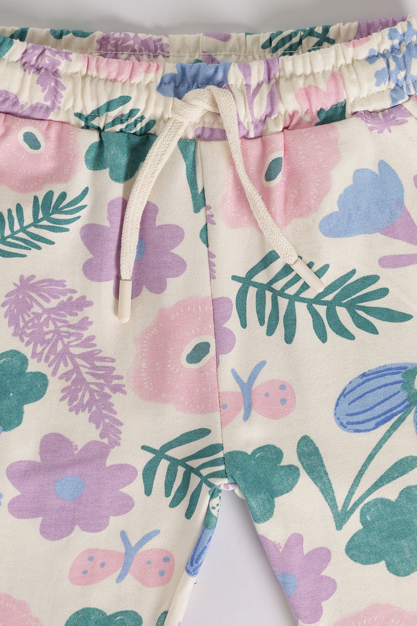 Off White Floral Regular Fit Jogger With 2 Pocket For Girls - Image 4