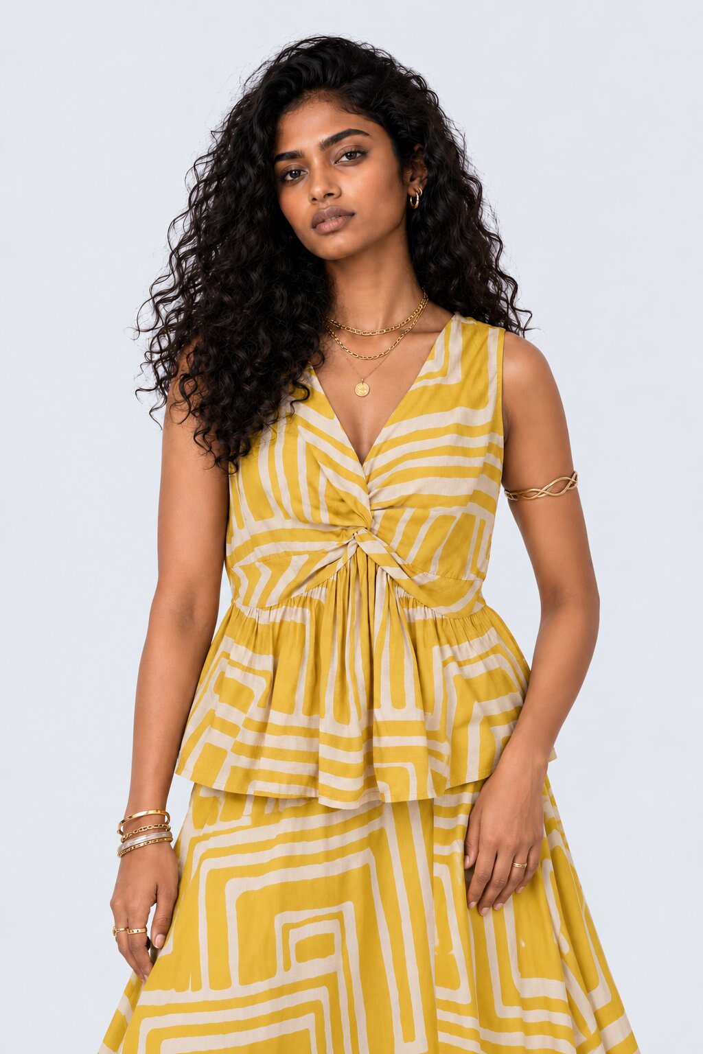 Womens Yellow Geometric Print Peplum Top - Image 1