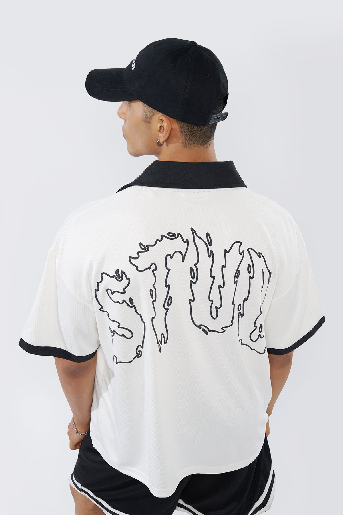 Off White Graphic Printed Oversized Fit T-Shirt for Men - Image 1